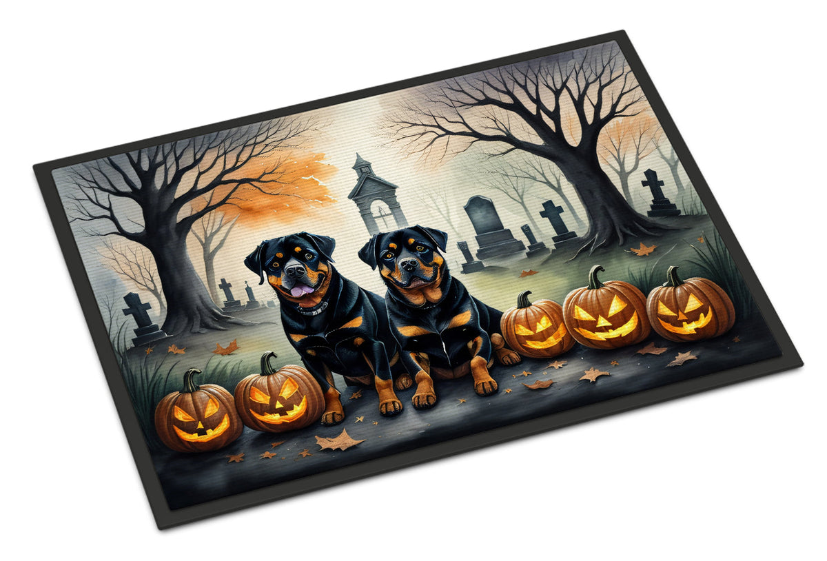 Halloween rottweiler doormat: two rottweilers, jack-o-lanterns, and graveyard scene