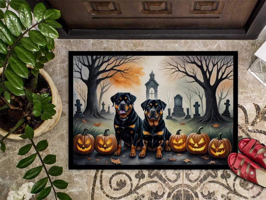 Halloween rottweiler doormat with two rottweilers, jack-o-lanterns, and spooky cemetery