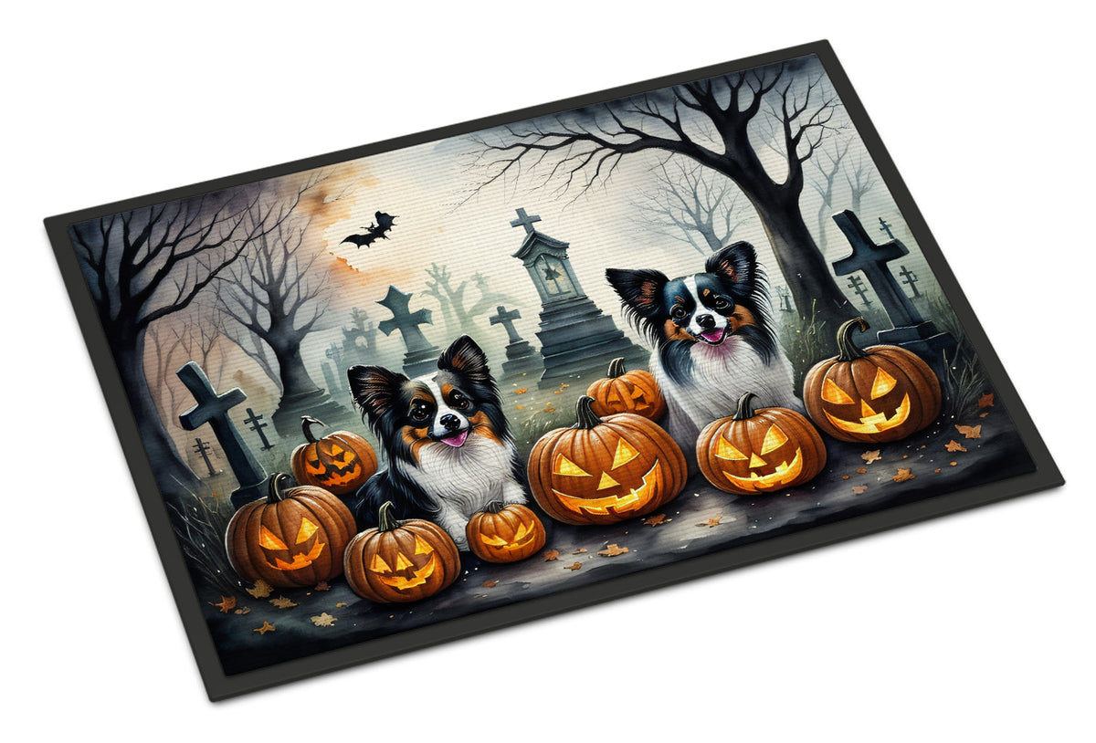 Spooky Halloween doormat with border collies, carved pumpkins, and cemetery crosses