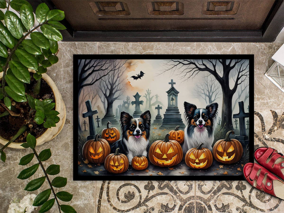 Spooky Halloween doormat with dogs, orange pumpkins, and dark graveyard silhouettes