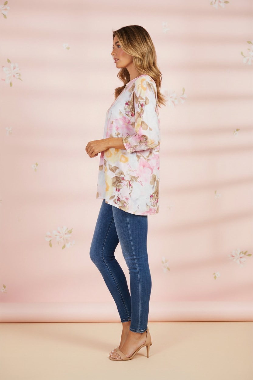 Blush pink floral round-neck 3/4-sleeve top, side view