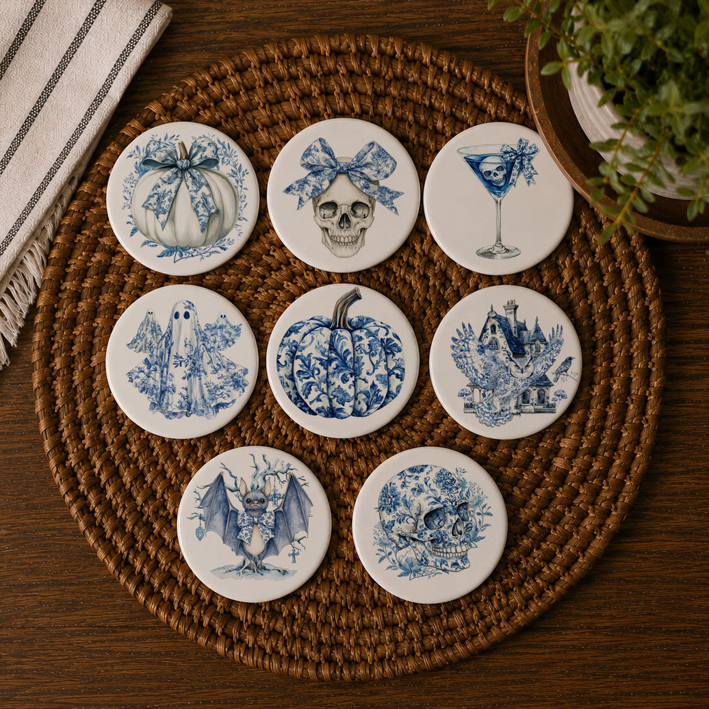 Blue-and-white Halloween coaster set with mixed designs: bow pumpkin, skull, bat, and owl.