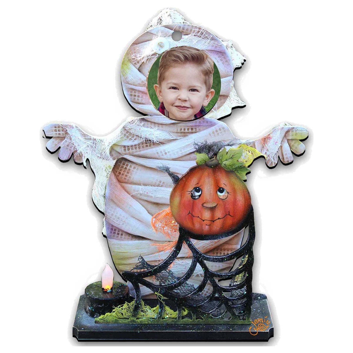 Halloween yard decor figure: child in mummy costume holding a jack-o’-lantern